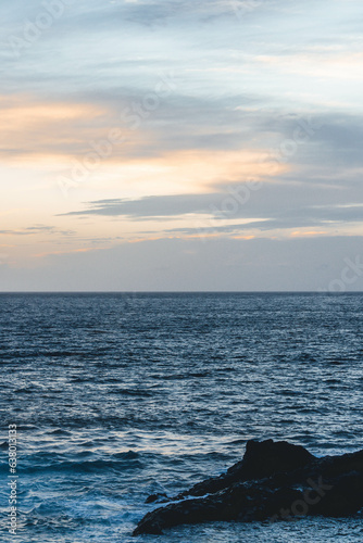 Sunset golden hour colors with grey clouds © Radu