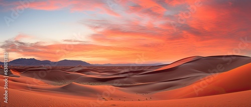A panoramic view of an endless desert, its sand dunes shaped by the wind, glistening under a fiery sunset. Wallpaper, backgrounds graphics. Generative AI. 