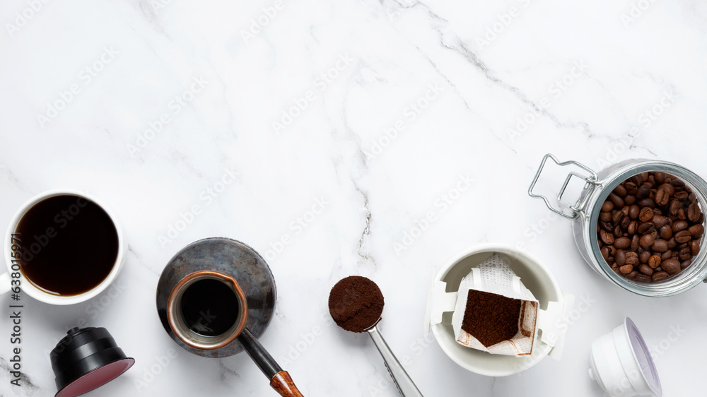 Ingredients for making coffee. Different ways to make coffee metal cezve, coffee machine capsules, drip. Coffee making concept. Flat Lay. Top view. Copy space