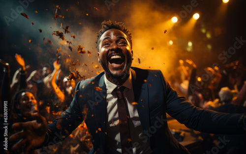 A man in a suit and tie is surrounded by confetti