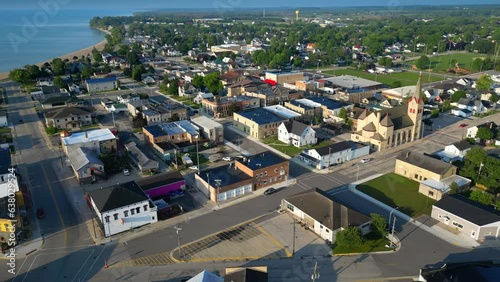 Beautiful Great Lakes harbor town, Algoma, Wisconsin, moving aerial view.
 photo