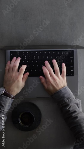 Businessman typing on a computer keyboard
