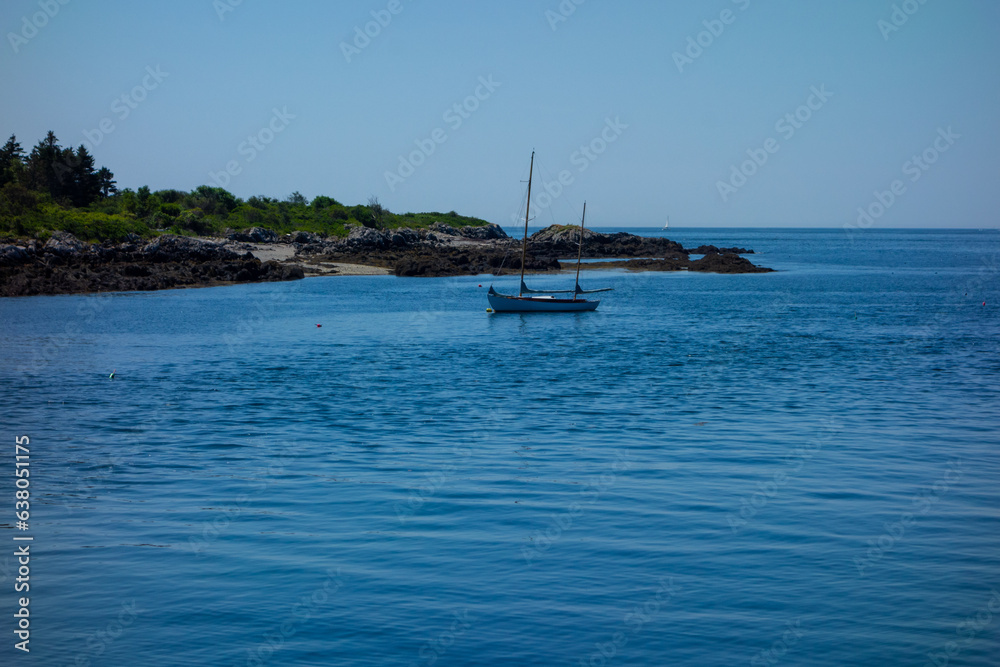 Sailboats and fishing boats moored in the bay in Harpswell, Maine. Pictures taken in the summer