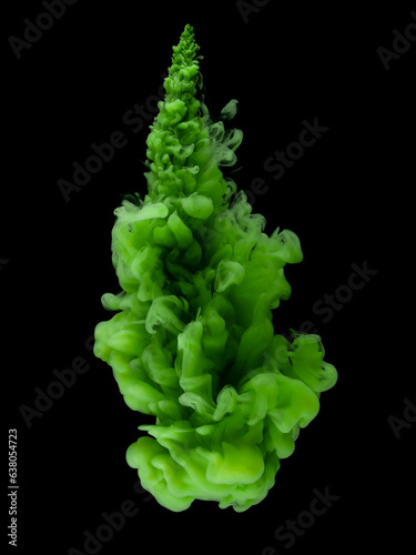 Green acrylic paints, gouache dissolve beautifully in liquid isolated on a black background. Abstract banner. Vertical photo.