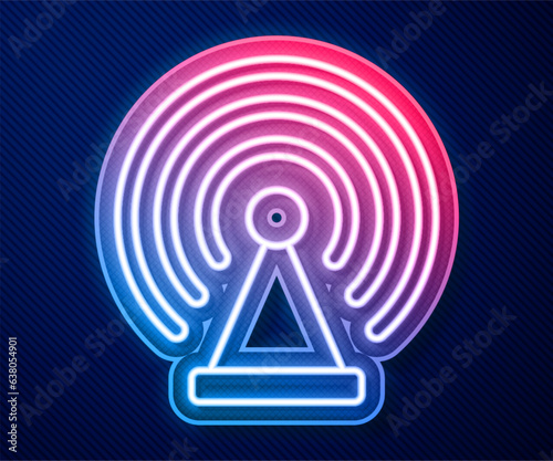 Glowing neon line Radar icon isolated on blue background. Search system. Satellite sign. Vector