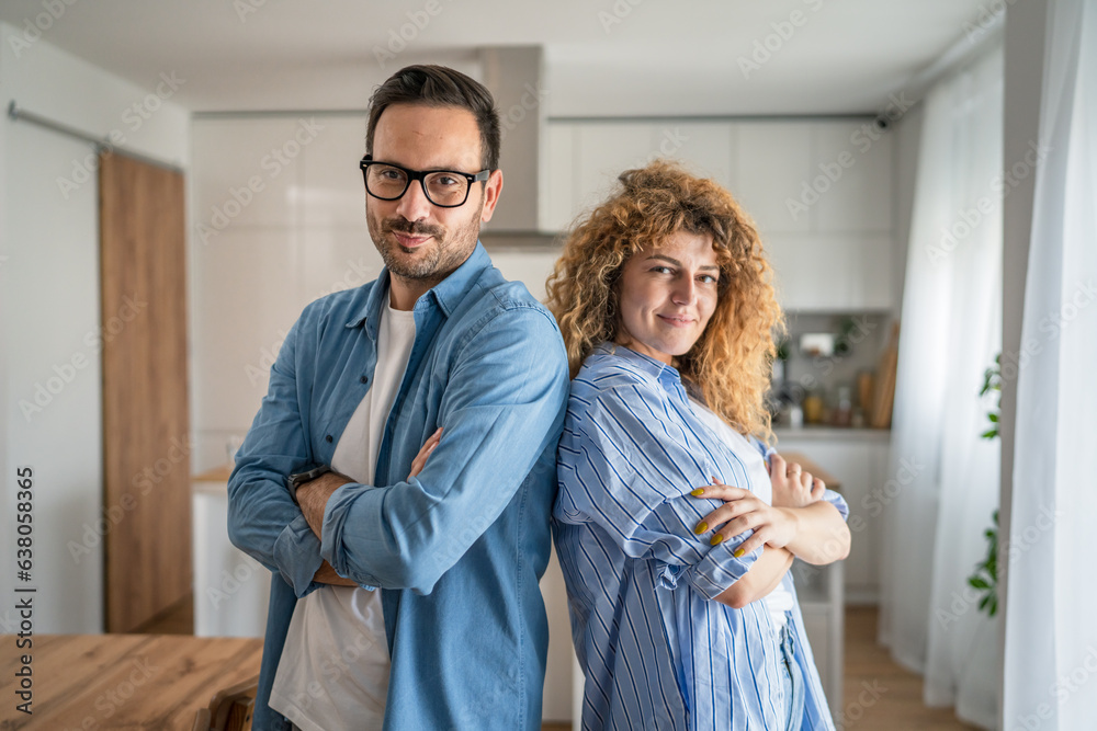 Happy adult caucasian couple at home husband and wife family concept Happy adult caucasian couple at home husband and wife family concept