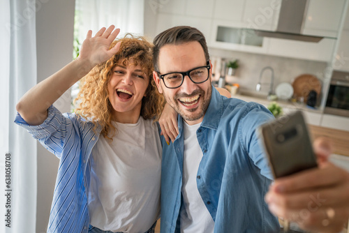 Happy adult caucasian couple at home husband and wife family concept