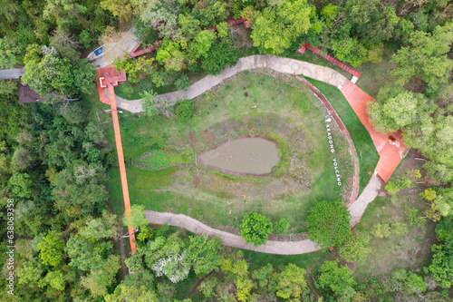 Aerial top view of Kradong Volcano with forest trees in Buriram, Thailand. Tourist attraction landmark. Nature landscape background photo