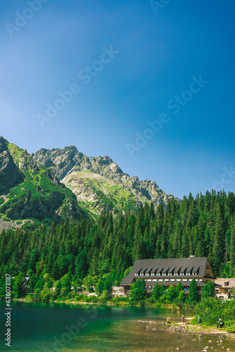 Slovakia - Popradske pleso - Mountain Hut - Blue sky and mountain in the background - sunny weather, lake © Adam