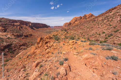 hiking the syncline loop trail in island in the sky district of canyonlands national park, utah, usa