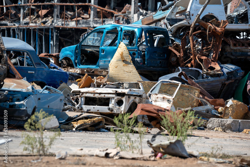 damaged and looted cars in a city in Ukraine during the war