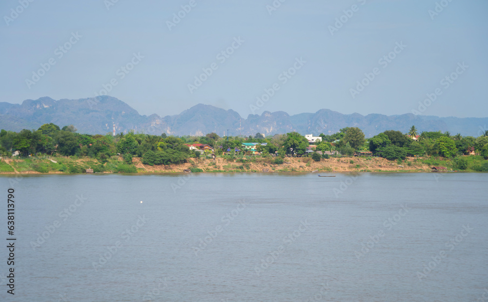 Aerial view of Mekong River with green mountain hill. Nature landscape background in Ubon Ratchathani, Thailand and Laos.