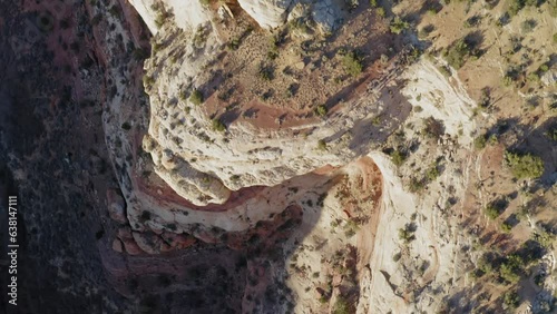 Flying over Calf Creek rock canyon gorge in Escalante Utah looking straight down photo