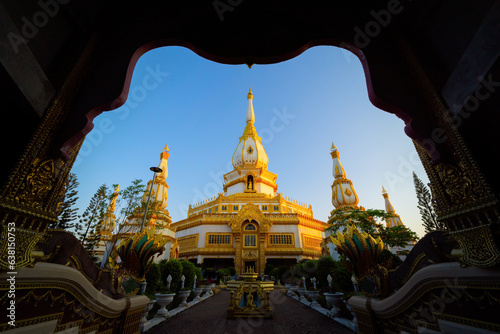 Wat Pha Nam Thip Thep Prasit Wanaram is a buddhist temple in Roi et, an urban city town, Thailand. Thai architecture landscape background. Tourist attraction landmark. photo