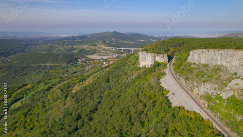 AERIAL: Stunning climbing area with picturesque views of rugged Karst landscape