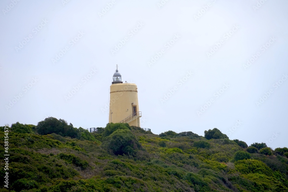 View towards the the Faro Punta Carbonera lighthouse from La Alcaidesa, Mediterranean Sea, Costa del Sol, Andalusia, Malaga, Spain