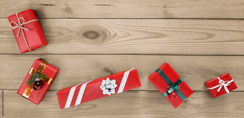 Obraz premium Banner with Christmas gifts wrapped in red paper. A classic gift box packaging idea. Personalized Present. Preparing for Christmas and New Year. Header for advertising, website, blog, shop.