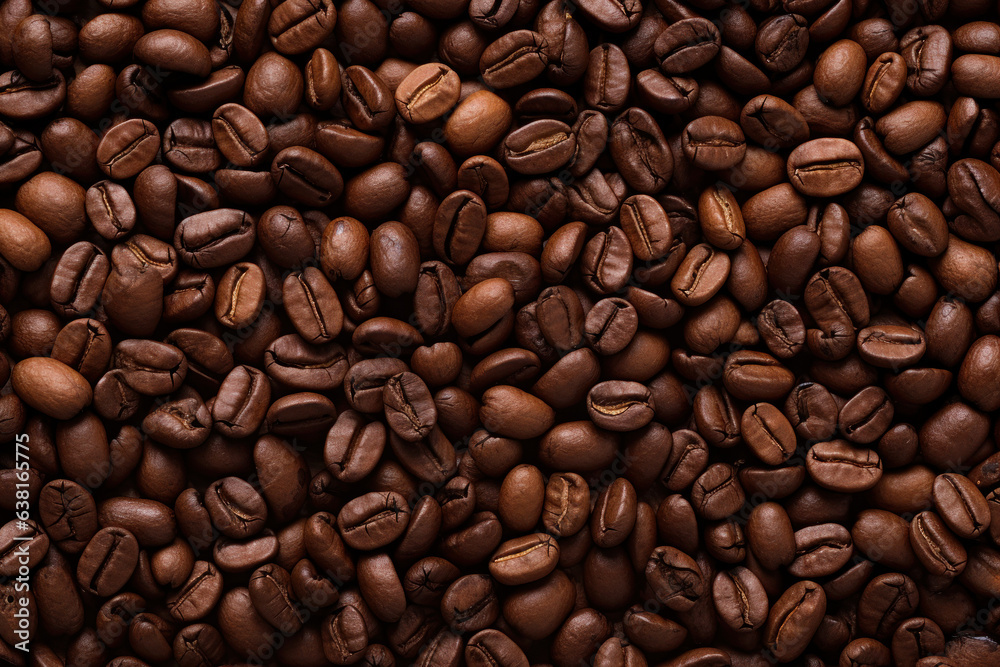 Fototapeta premium Close close-up of roasted coffee beans with copy space.