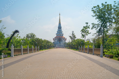 Aerial top view of Wat Pa Ban Tad  The Isan pagoda is a buddhist temple Udon Thani  an urban city town  Thailand. Thai architecture landscape background. Tourist attraction landmark.
