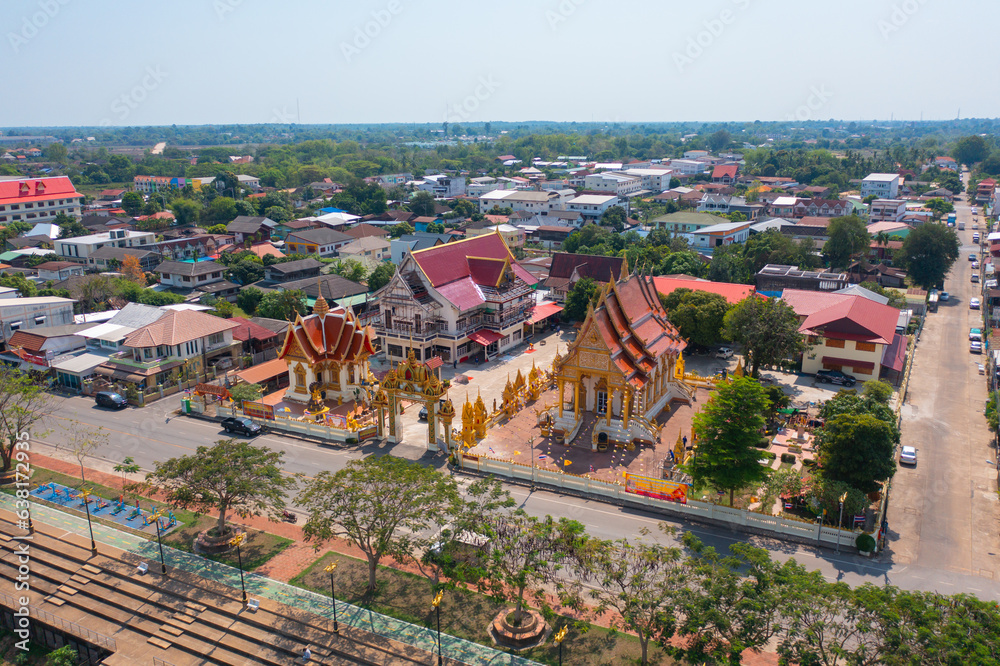 Aerial top view of The Isan pagoda is a buddhist temple near Bangkok, an urban city town, Thailand. Thai architecture landscape background. Tourist attraction landmark.