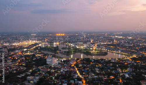 Aerial view of Udon Thani, residential neighborhood roofs. Urban housing development from above. Top view. Real estate in Kalasin, Isan province city, Thailand. Property real estate. photo