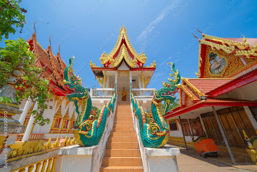 Fototapeta premium The Isan pagoda is a buddhist temple near Bangkok, an urban city town, Thailand. Thai architecture landscape background. Tourist attraction landmark.