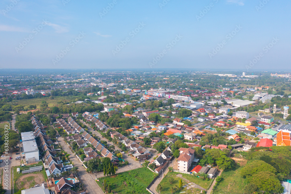 Aerial view of local residential neighborhood roofs. Urban housing development from above. Top view. Real estate in Isan, Khon Kaen urban city town, Thailand. Property real estate.