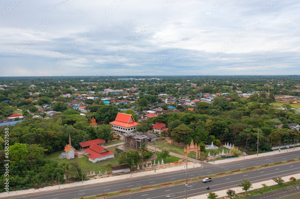 Aerial view of local residential neighborhood roofs. Urban housing development from above. Top view. Real estate in Isan urban city town, Thailand. Property real estate.