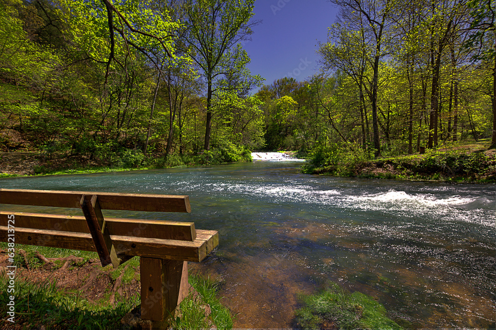 Rock Dam. From this bench you can watch the water flow over the rock fill dam. Built to divert the water into two streams which was used to run the furnace, forges and grist mill. Rock Dam. From this bench you can watch the water flow over the rock fill dam. Built to divert the water into two streams which was used to run the furnace, forges and grist mill.
