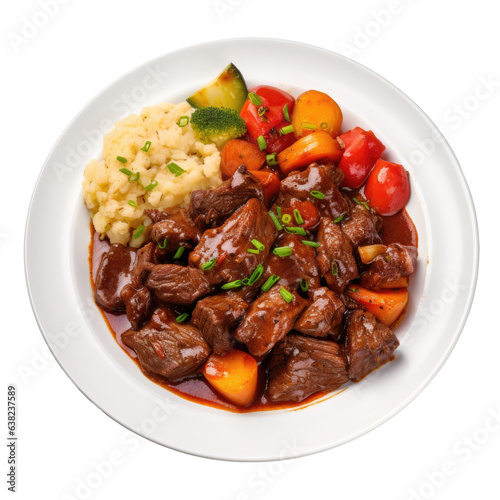 East European cuisine goulash with roast beef vegetables on a white plate set on a transparent background