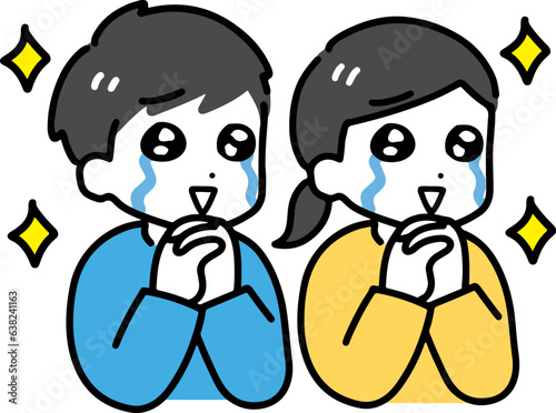 笑顔で涙を流す私服の男女