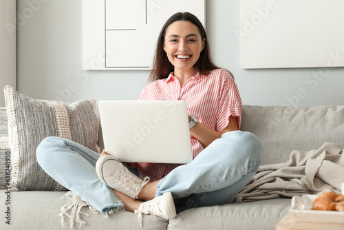Young woman with wristwatch...