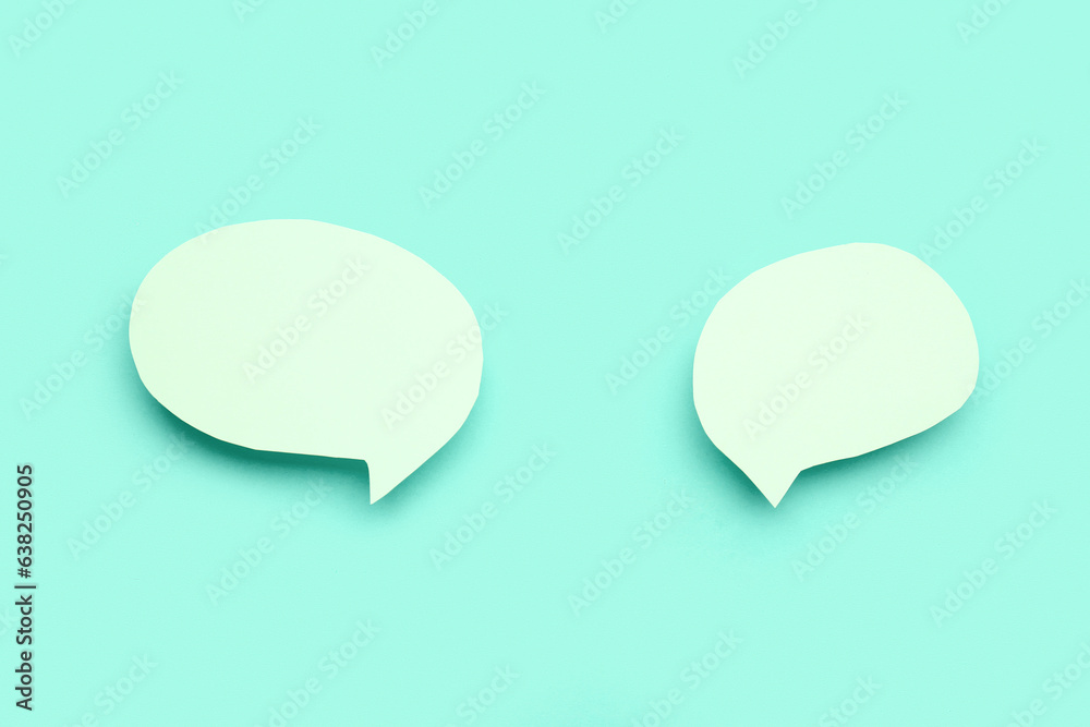 Blank speech bubbles on turquoise background Blank speech bubbles on turquoise background