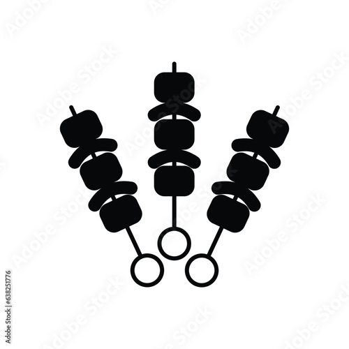 BBQ skewers icon design. Shashlik on a skewer icon. Isolated on a white background. 