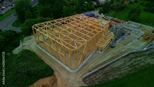 Aerial View of Wooden-frame House Under Construction. photo