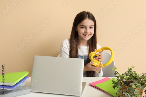 Little girl with headphones...