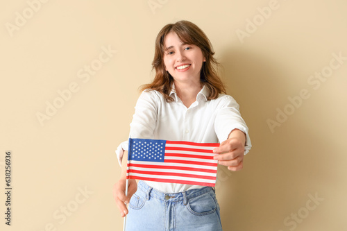 Young woman with USA flag o...