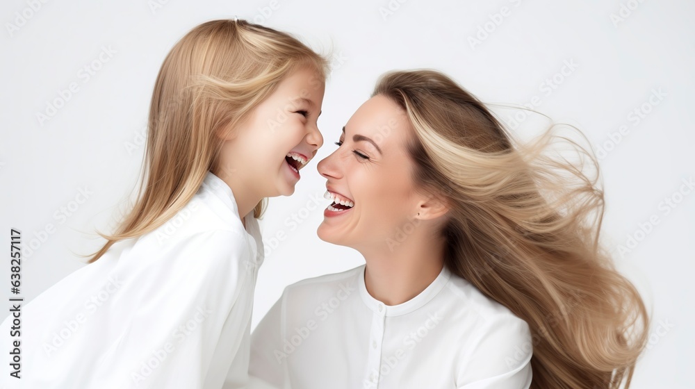 A playful girl and mother enjoying themselves on a white background. A playful girl and mother enjoying themselves on a white background.