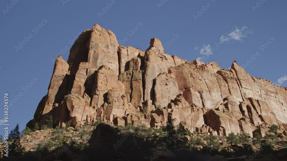 Looking up while driving past imposing castle rock formation, Escalante Utah Looking up while driving past imposing castle rock formation, Escalante Utah