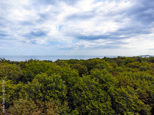 Obraz na płótnie Aerial view landscape, view of forest, horizon, sea and blue sky in Kolobrzeg w salonie
