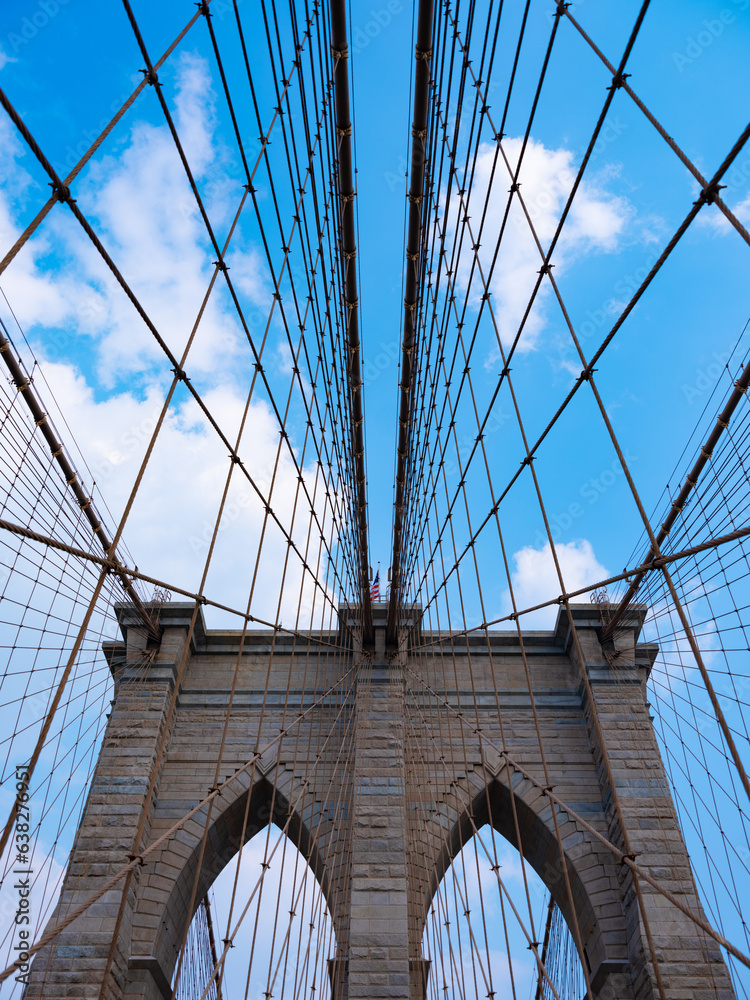 Fototapeta premium urban architecture of new york city. brooklyn landmark. Brooklyn bridge in ny, usa. brooklyn bridge of new york city. new york bridge connecting Manhattan and Brooklyn. way to midtown manhattan
