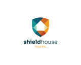 Colorful shield house mosaic logo
