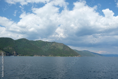 Irkutsk region, Russia - 06.23.2018 : Lake Baikal and the coastal area with hills and different vegetation.