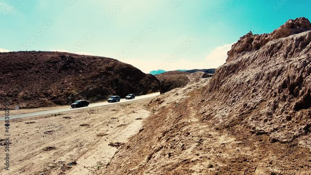 a canyon with a river between mountains and palm trees a canyon with a river between mountains and palm trees