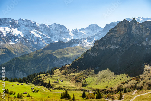 Traditional alpine village in touristic valley Lauterbrunnen, Switzerland attraction