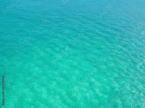Beautiful tropical turquoise clear sea water surface