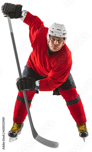 Photography Concentrated man, hockey player in uniform standing with stick isolated on trans