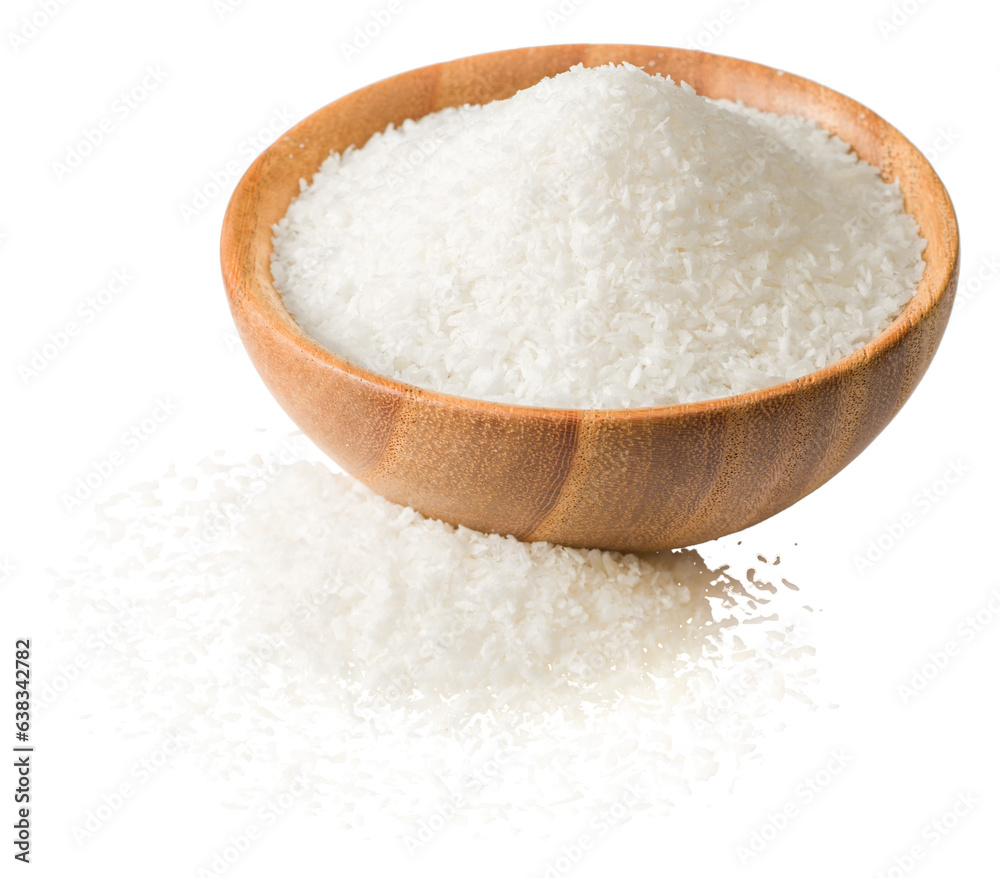 Shredded coconut in the wooden bowl, isolated on the white background. Shredded coconut in the wooden bowl, isolated on the white background.