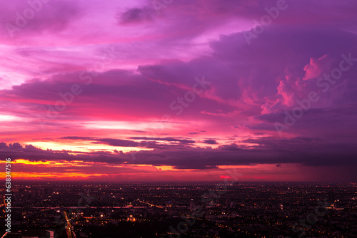 Colorful of sky and cloud in sunset,and twilight,with cityscape in the evening © Boykowit