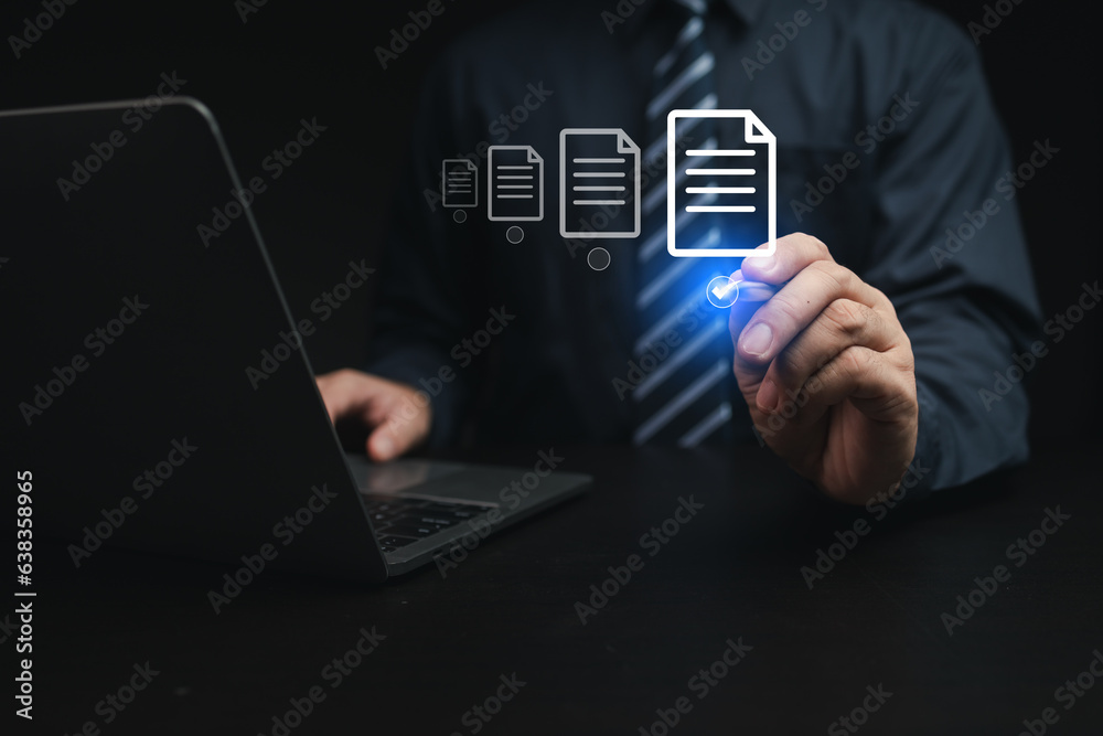 Person with document file hologram, businessman selecting data file on computer database stored, electronic file management. Managing data files on the database in an organized and secure way. Person with document file hologram, businessman selecting data file on computer database stored, electronic file management. Managing data files on the database in an organized and secure way.